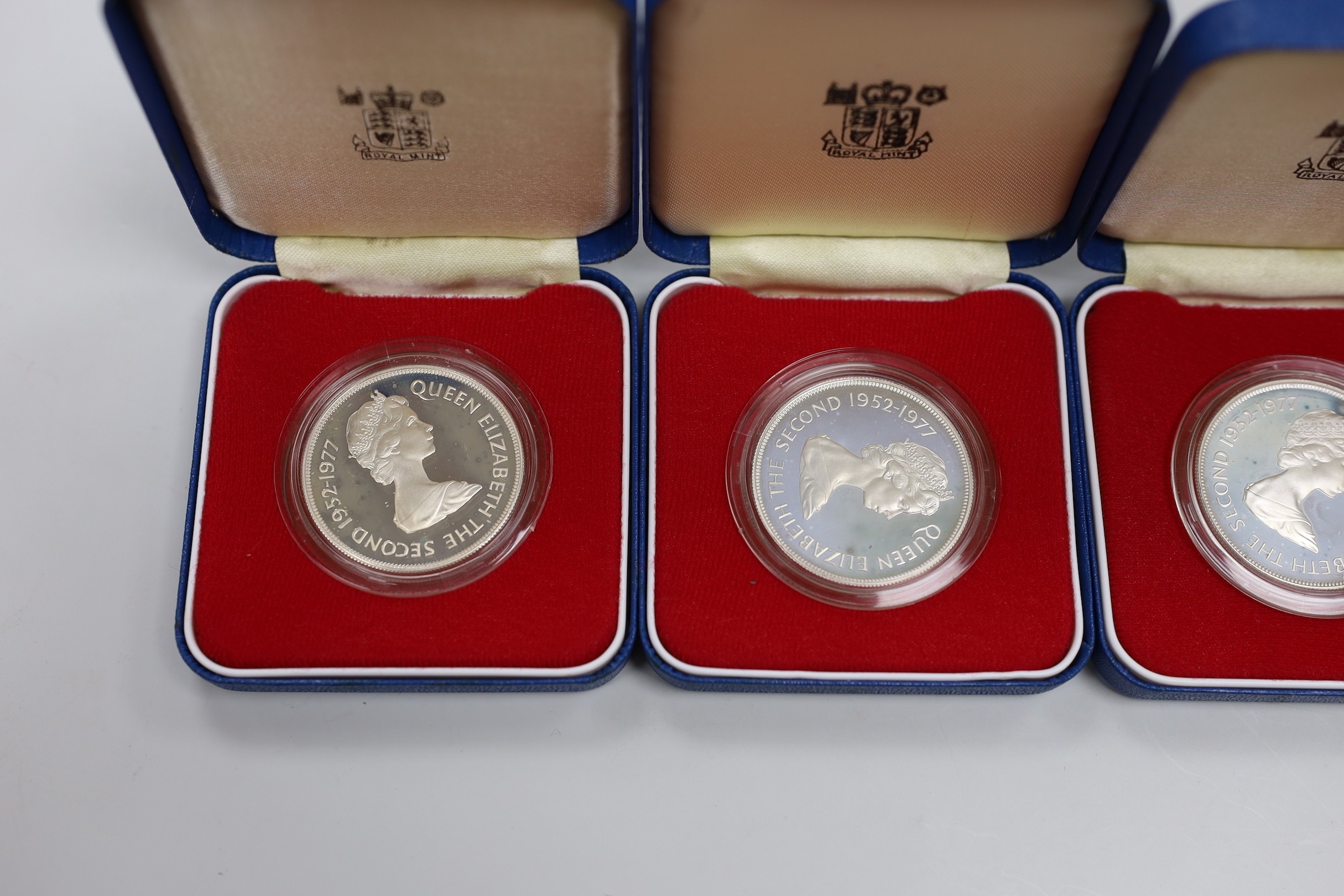Eight Royal Mint Commonwealth commemorative proof silver crowns